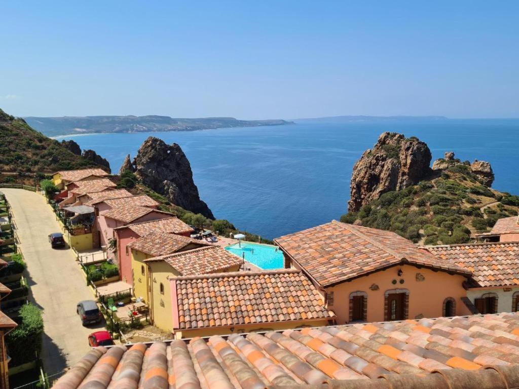L'Estasi Tanca Piras A Bordo Piscina Con Vista Mare Villa Nebida Exterior photo